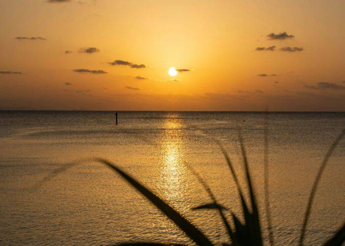 The waters of an Okinawa beach at sunset.